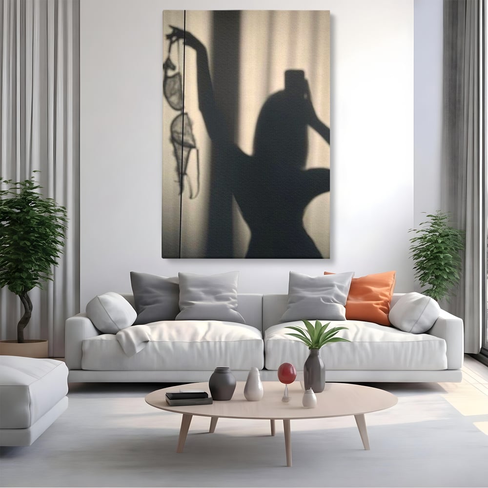 Tablou canvas cu tablou canvas cu silueta si umbra, fara rama, pe sasiu de lemn, pe perete intr-un living